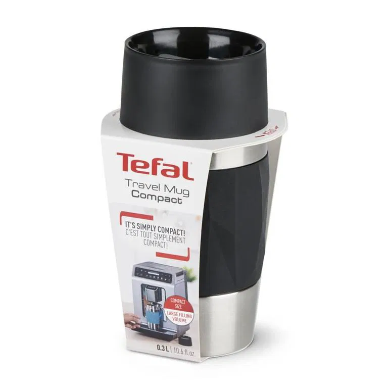 Siyah bir üst ve gümüş bir tabana sahip, beyaz bir arka plan üzerinde Tefal seyahat kupası kompakt.