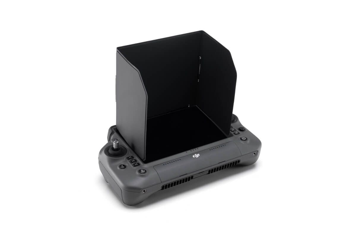Drohnen-Controller mit angebrachtem schwarzem Visier, dunkelgraue Farbe, auf weißem Hintergrund.