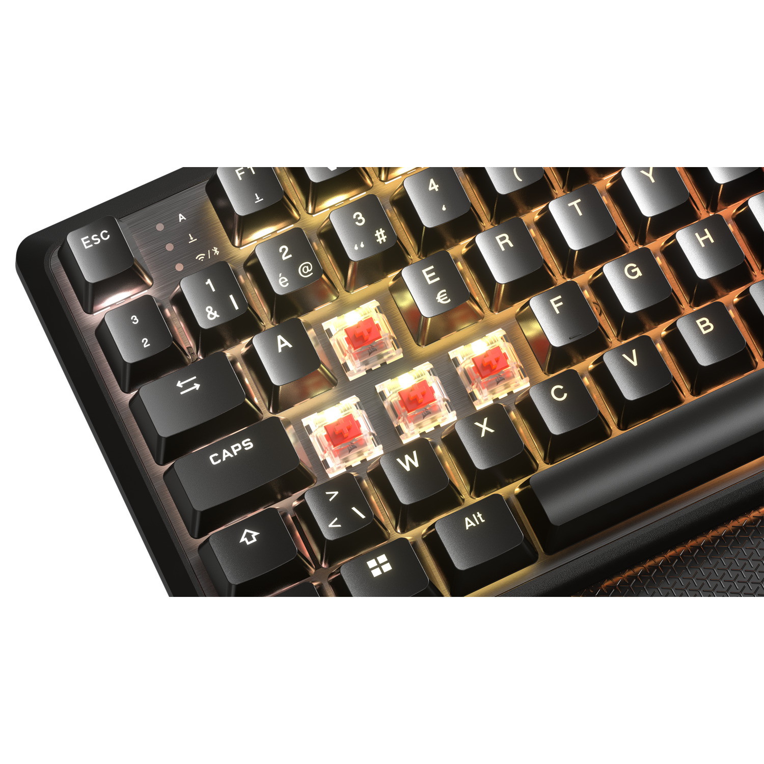 Close-up of a keyboard with illuminated red switches.