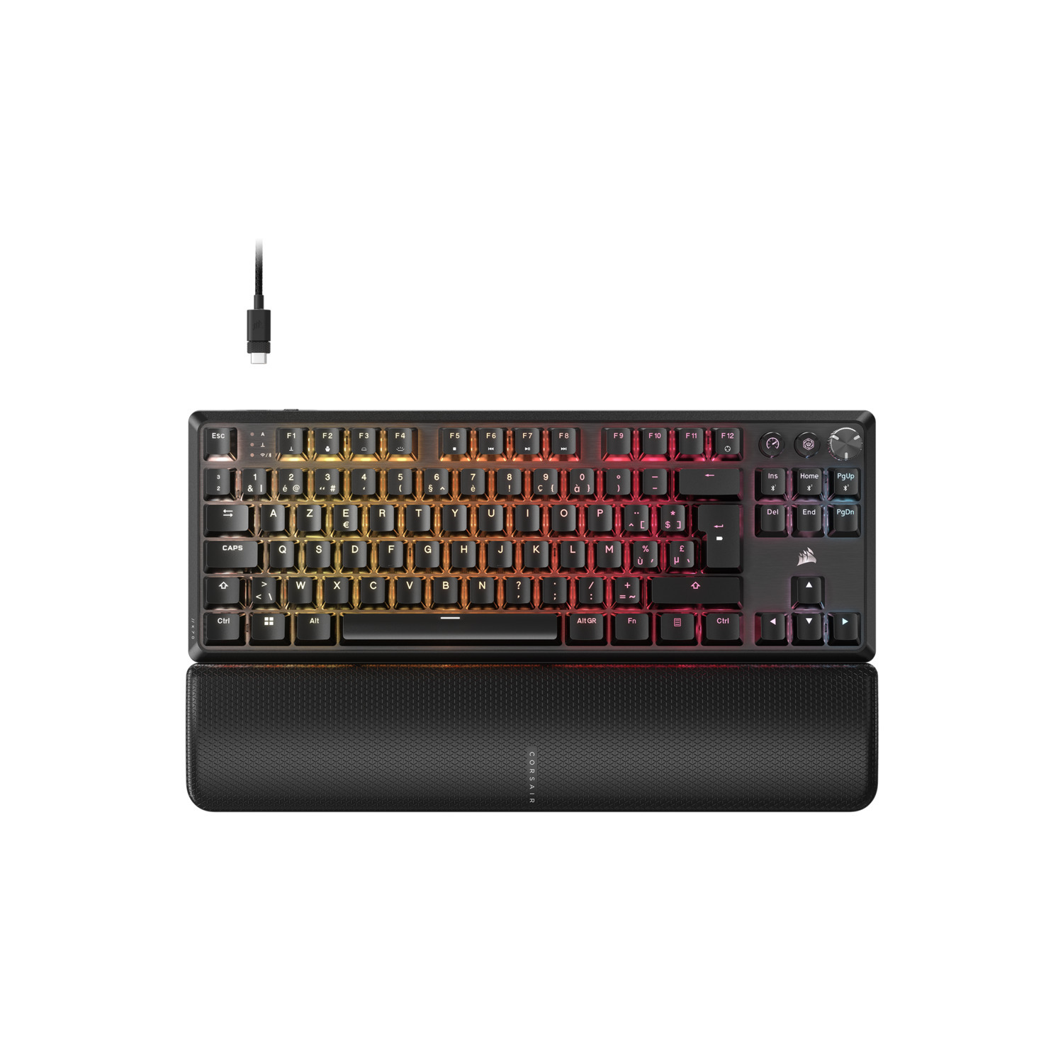 A black keyboard with colorful backlit keys and a wrist rest. A cable connects to the top of the keyboard.