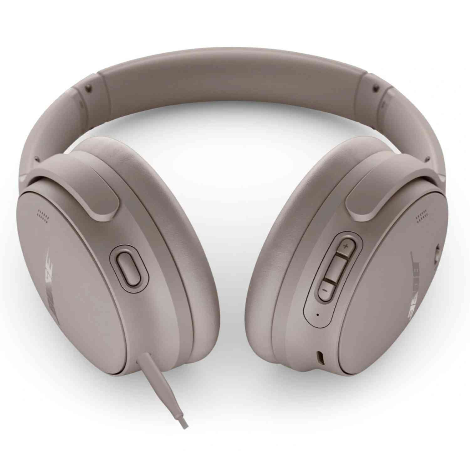 Over-ear headphones in a neutral color, with a cable and controls visible.