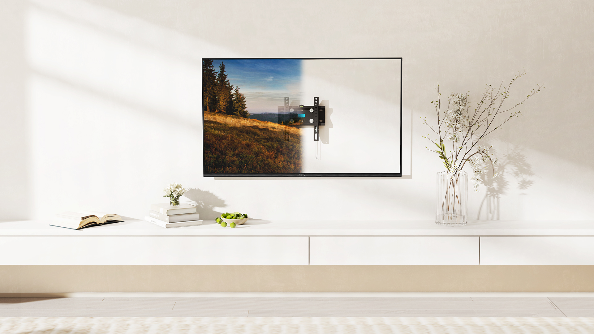 Ein Fernseher an einer weißen Wand montiert. Ein Landschaftsbild ist auf dem Fernseher sichtbar.