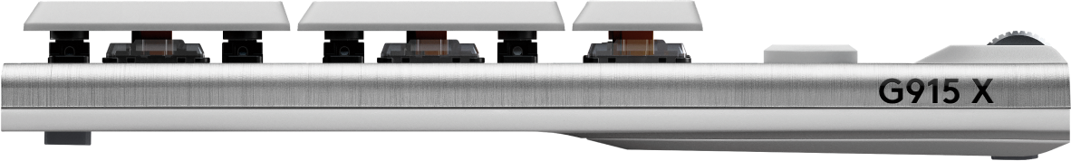 Gros plan sur un clavier mécanique blanc. Les touches et les interrupteurs rouges sont visibles.