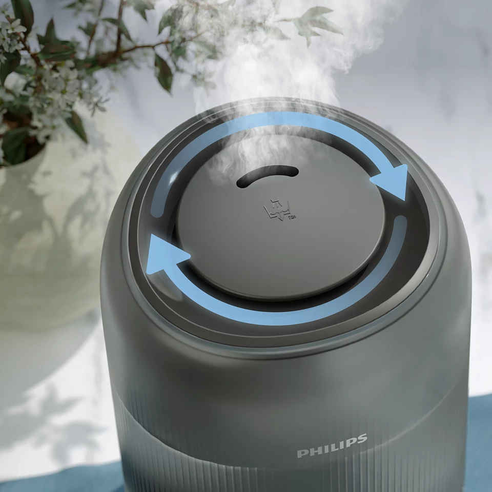 Egy szürke párásító kék nyilakkal, amelyek a gőz irányát jelzik. Philips logó alul.