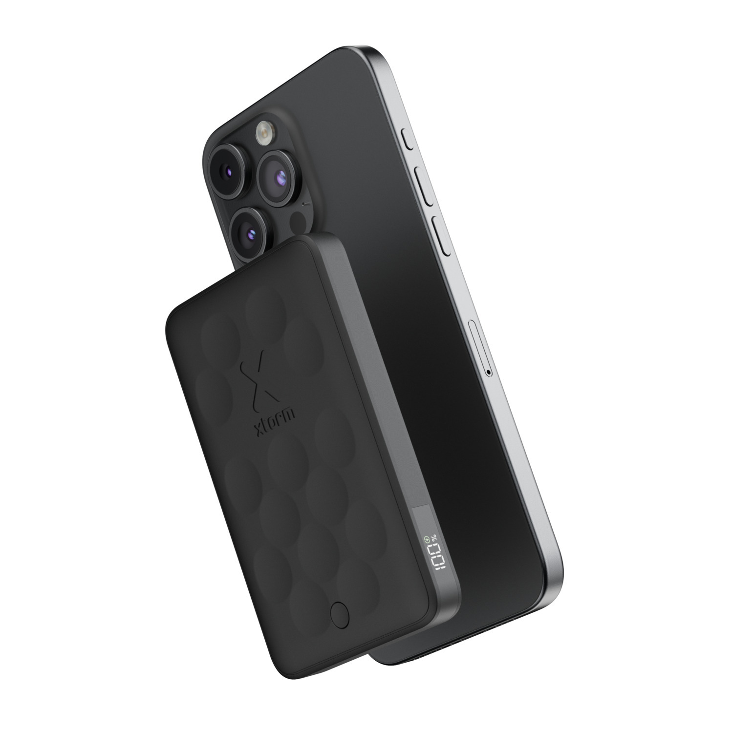 Un téléphone noir se chargeant à partir d'une batterie externe noire.