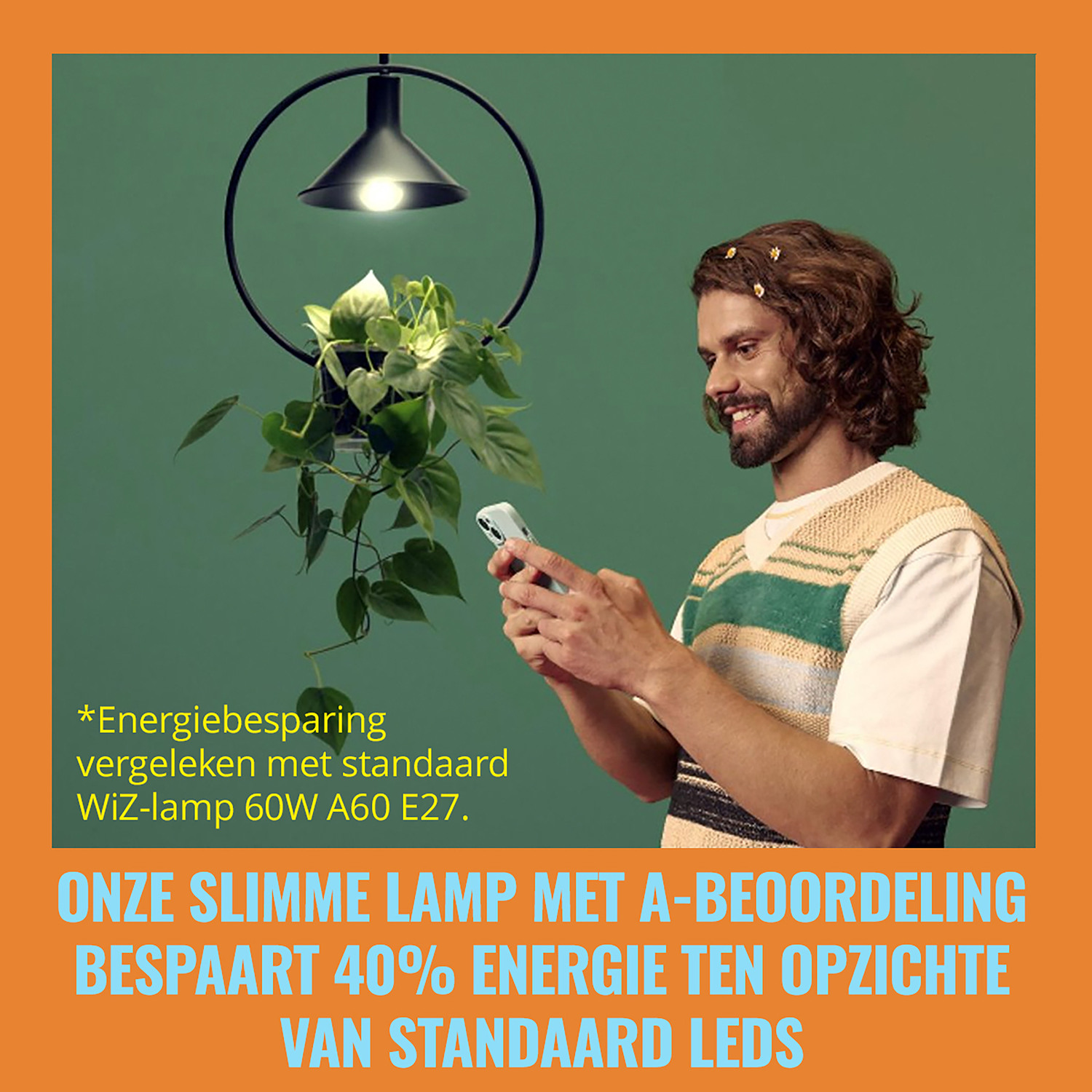 A man is using a smartphone to control a smart lamp. The scene is orange and includes a plant.