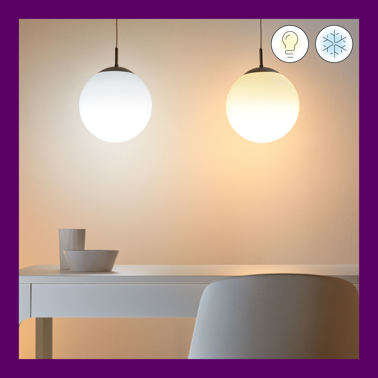 Deux lampes globe suspendues, une chaude et une froide.