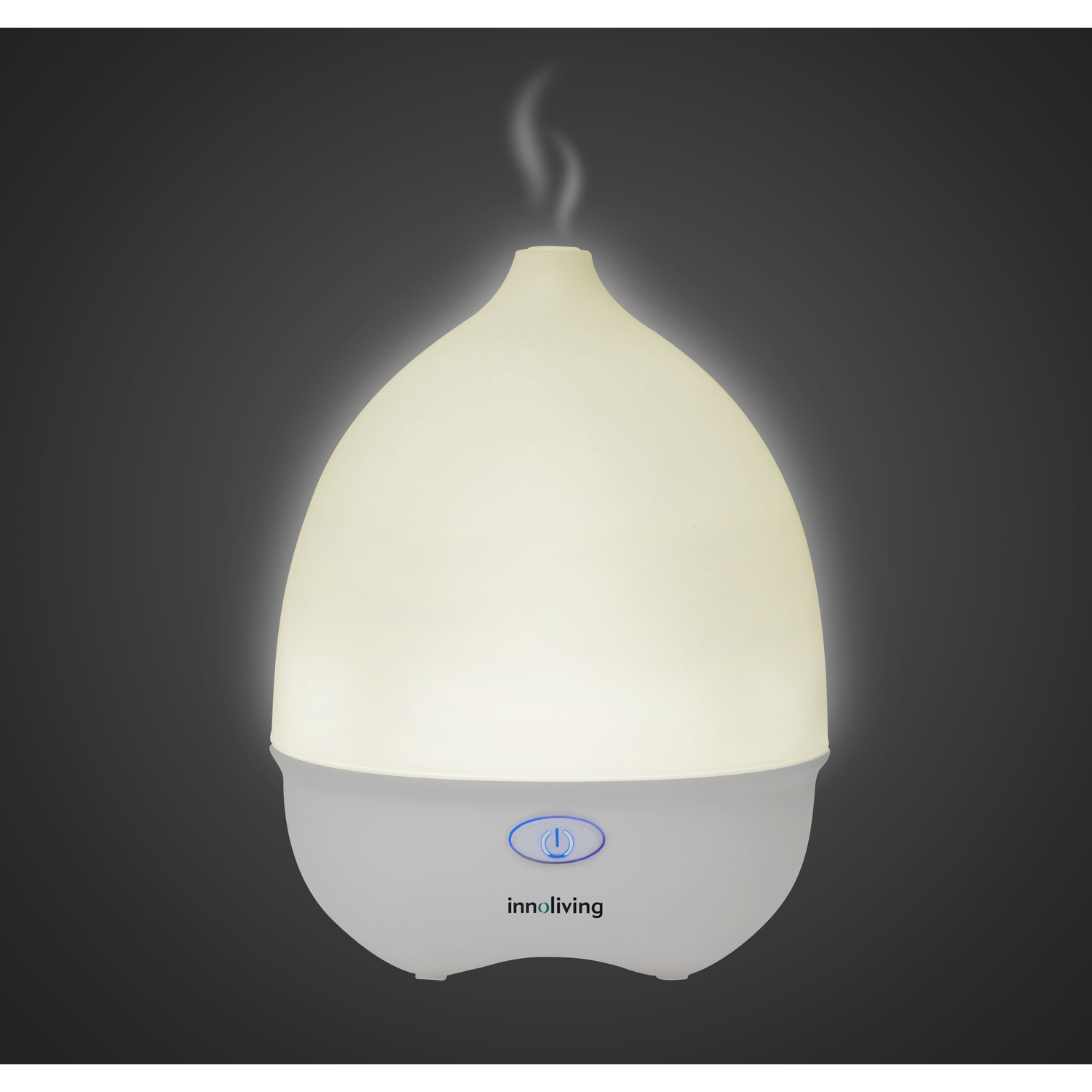Un diffusore di oli essenziali bianco e grigio, con la parte superiore luminosa e un pulsante di accensione.