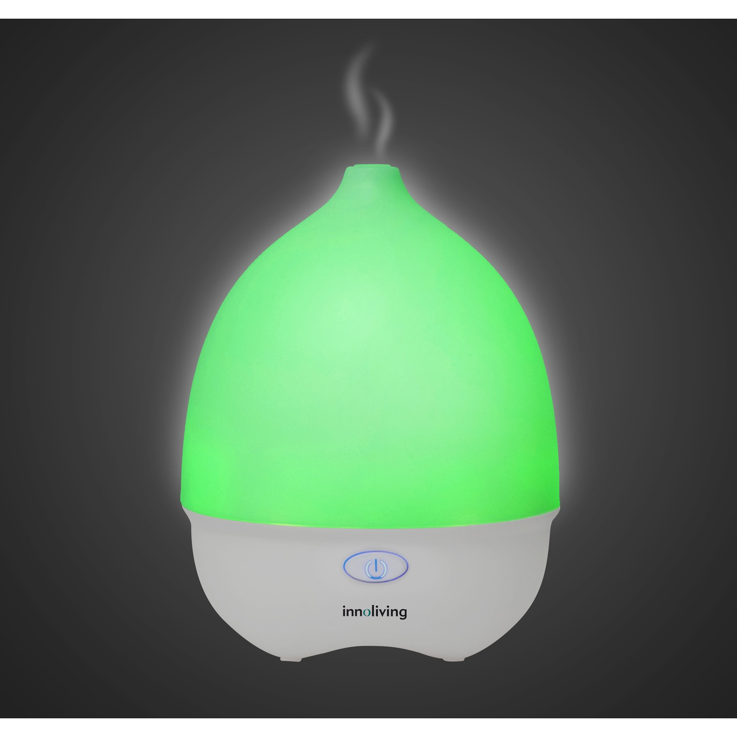 Un diffusore di aromi. È bianco e verde, con vapore che sale dalla cima.