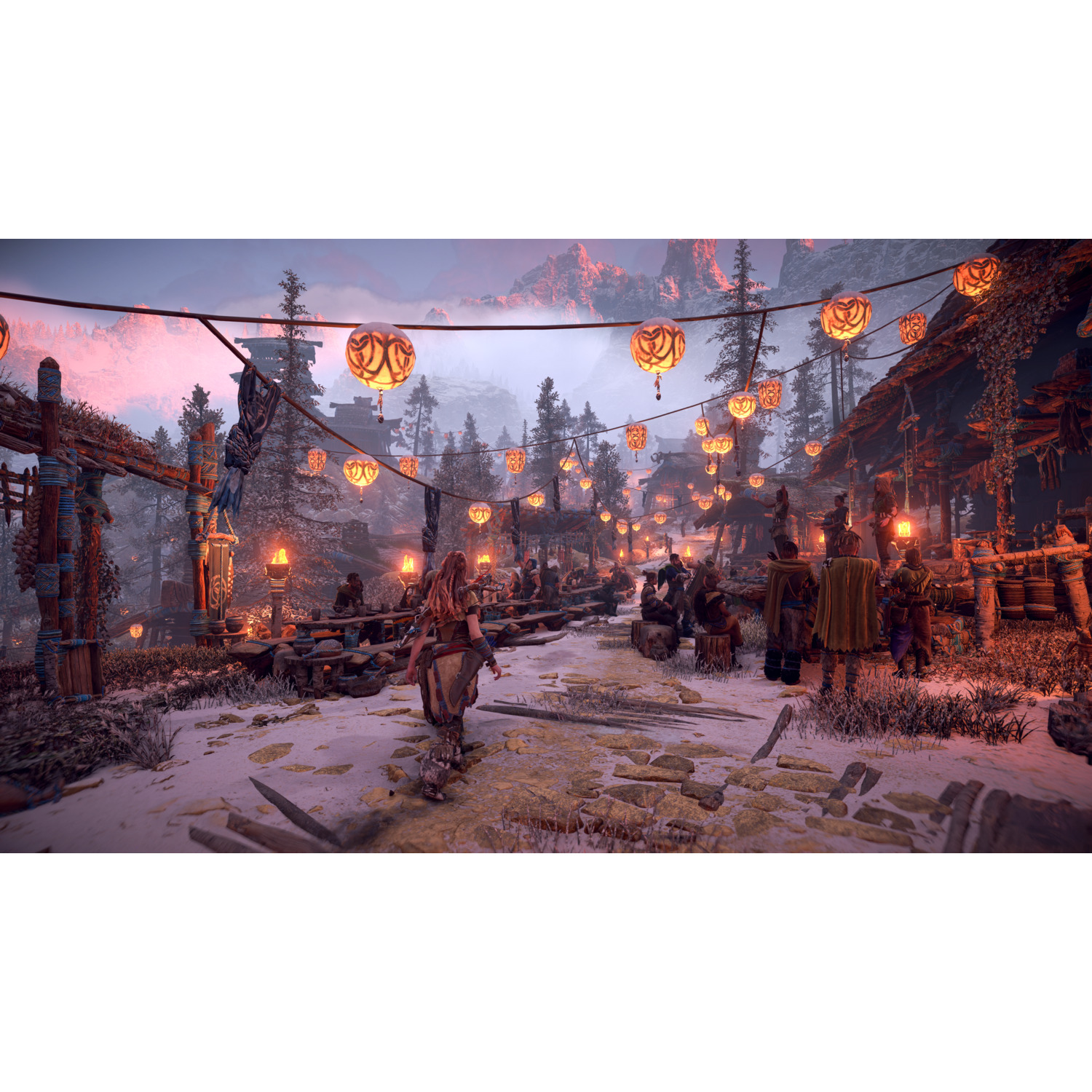 A game scene with characters, buildings, and lanterns in a snowy environment.