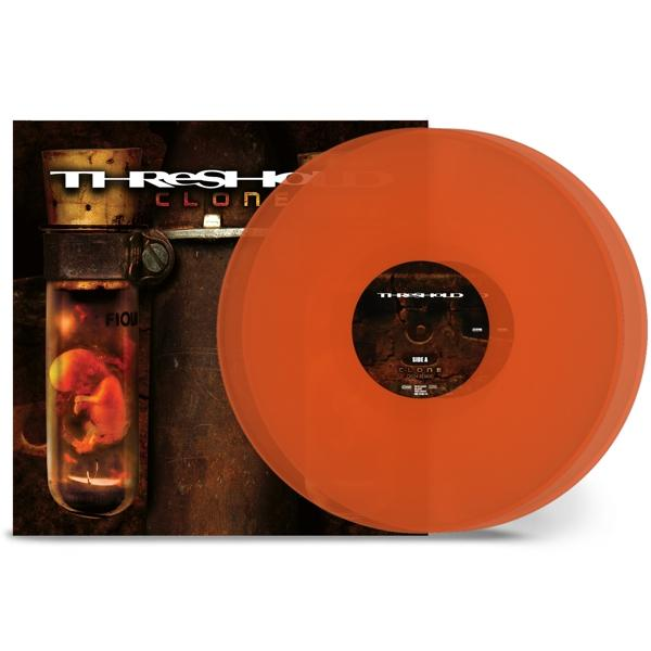 Narancssárga bakelit lemez album borítóval. Album címe: Clone. Előadó: Threshold. Narancs és barna tónusok.