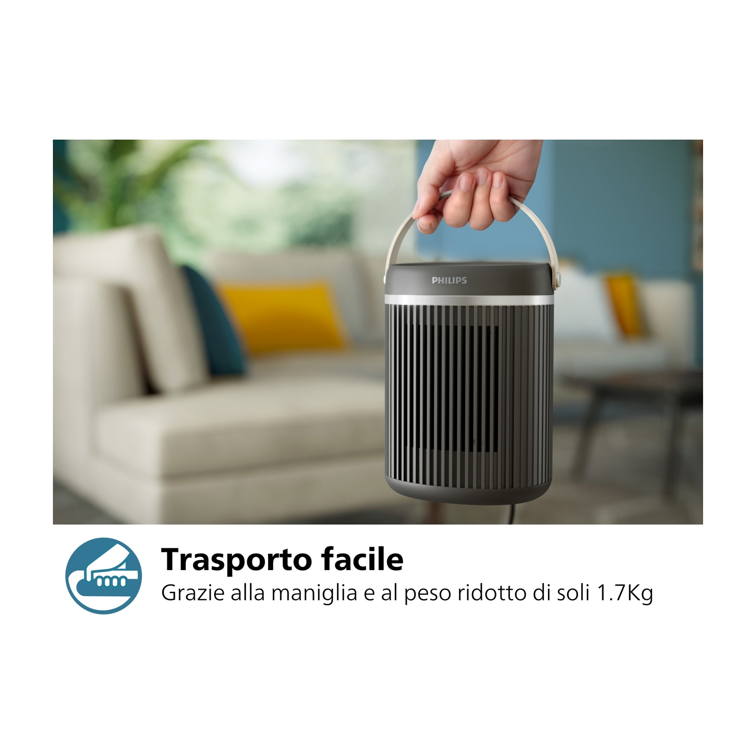 Riscaldatore cilindrico nero e grigio. Mano tiene la maniglia. Testo: Trasporto facile. Peso: 1,7 kg.