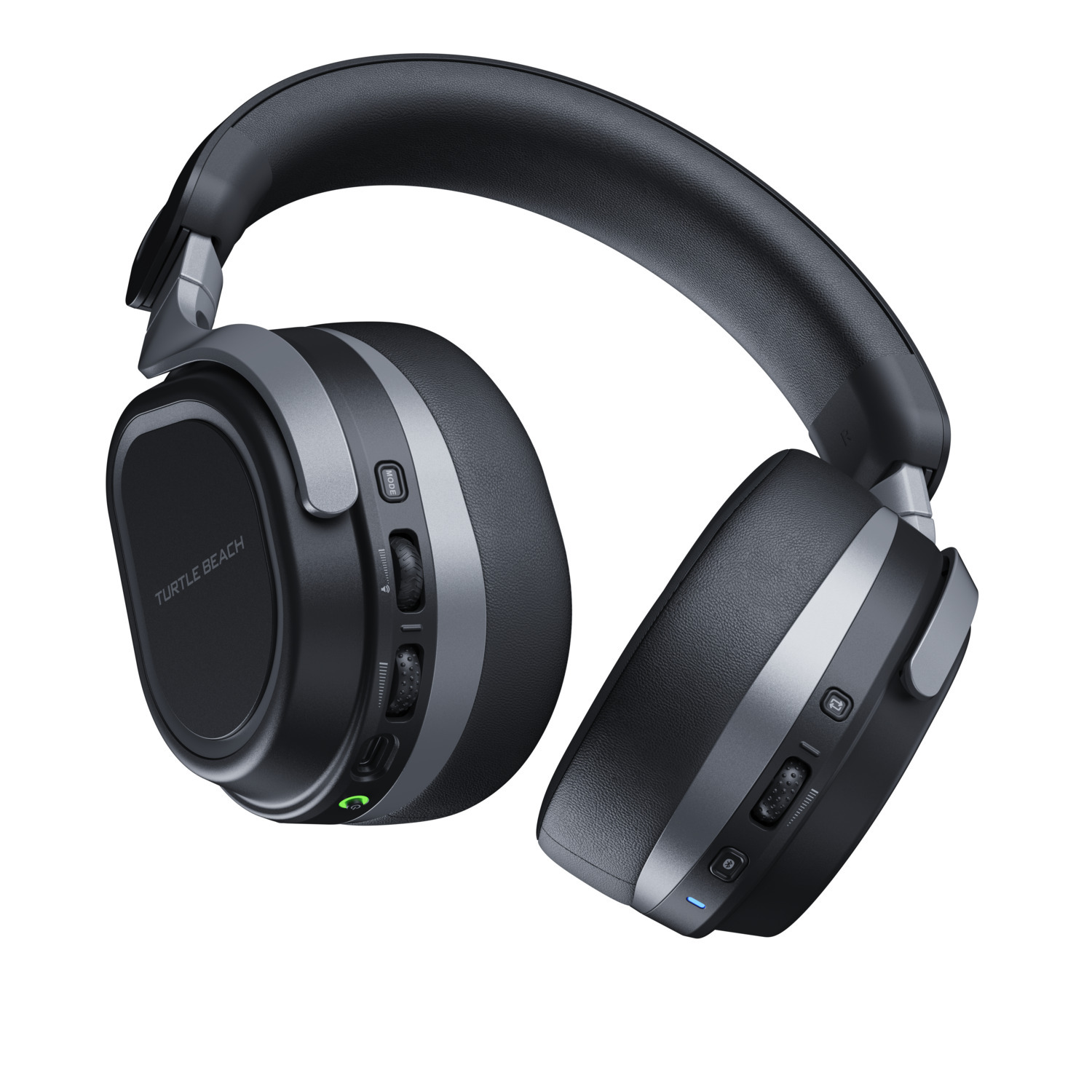 Casque de jeu noir et gris. Les oreillettes sont grandes et ovales. L'arceau est également noir et gris. Fond blanc.