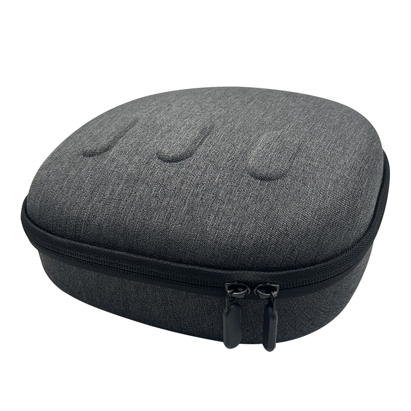 Graues, ovales Etui mit schwarzem Reißverschluss. Schlichtes Design.