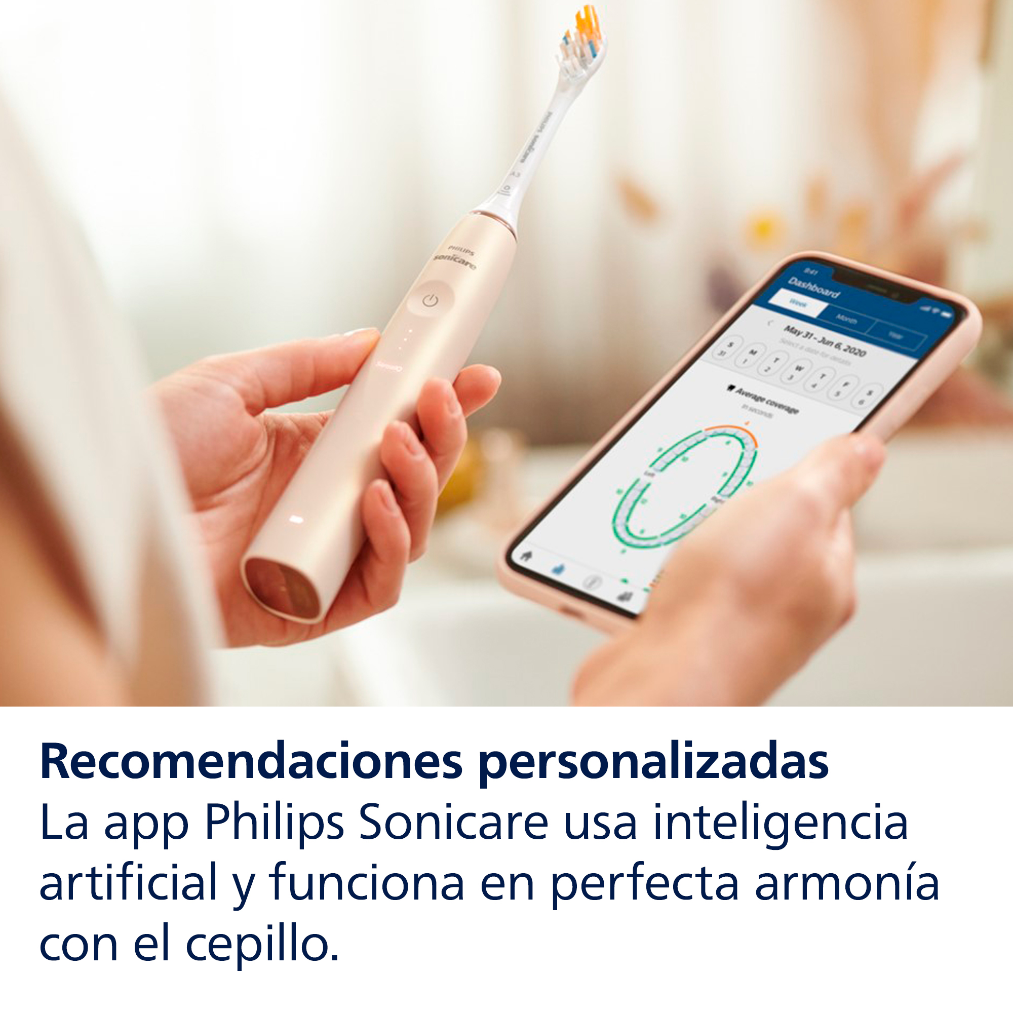 Una persona sostiene un cepillo de dientes eléctrico oro rosa y un teléfono que muestra un gráfico de cobertura de cepillado.