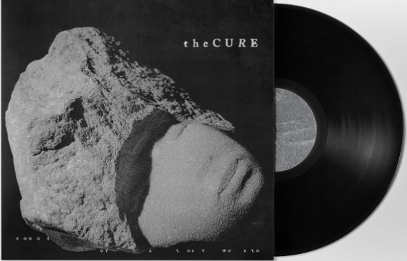 The Cure Albumcover, Schwarzweiß. Zeigt einen Felsen und den Albumtitel. Schallplatte rechts.