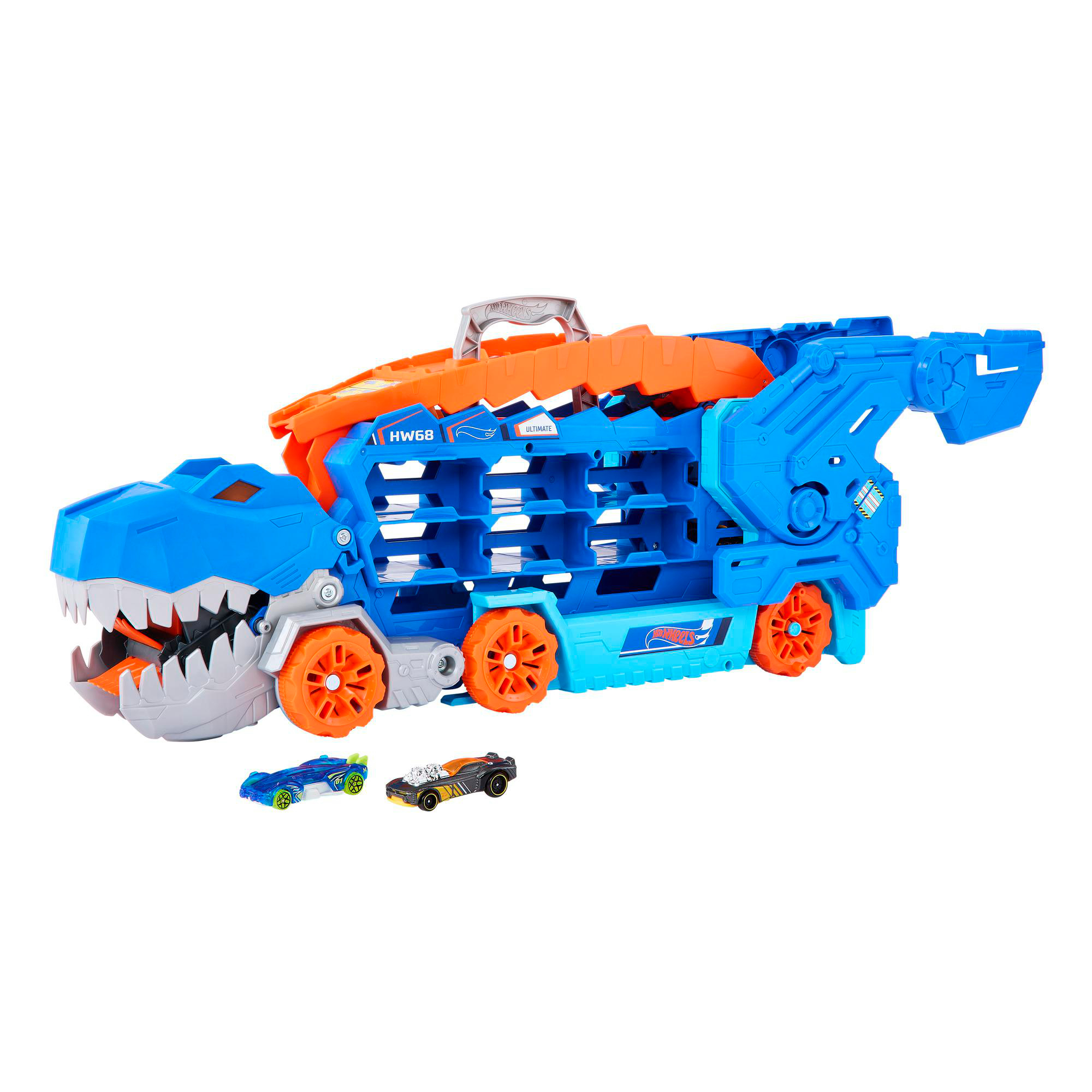 Ein blaues Spielzeug-Truck mit Hai-Design transportiert Spielzeugautos.
