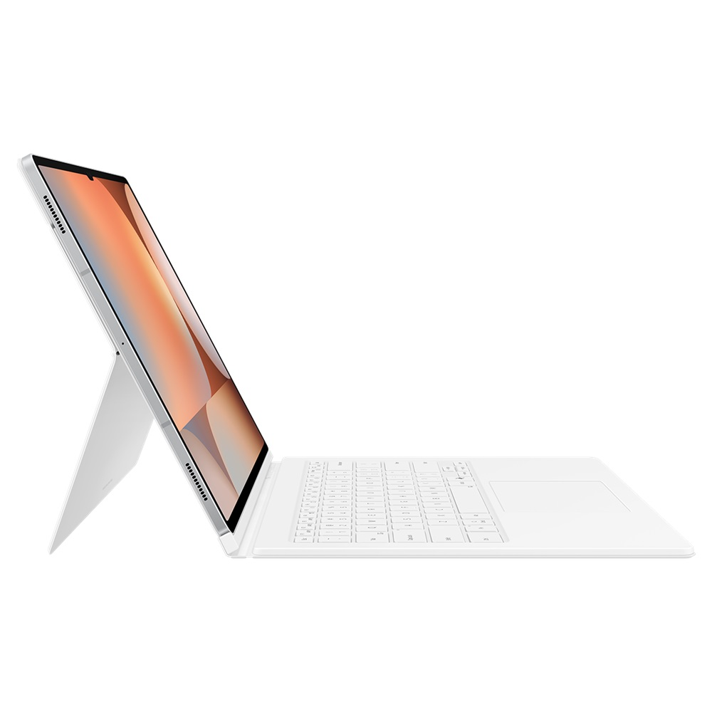 Beyaz klavyeli tablet. Ekran turuncu ve beyaz bir görüntü gösteriyor. Cihaz beyaz bir yüzeyde.