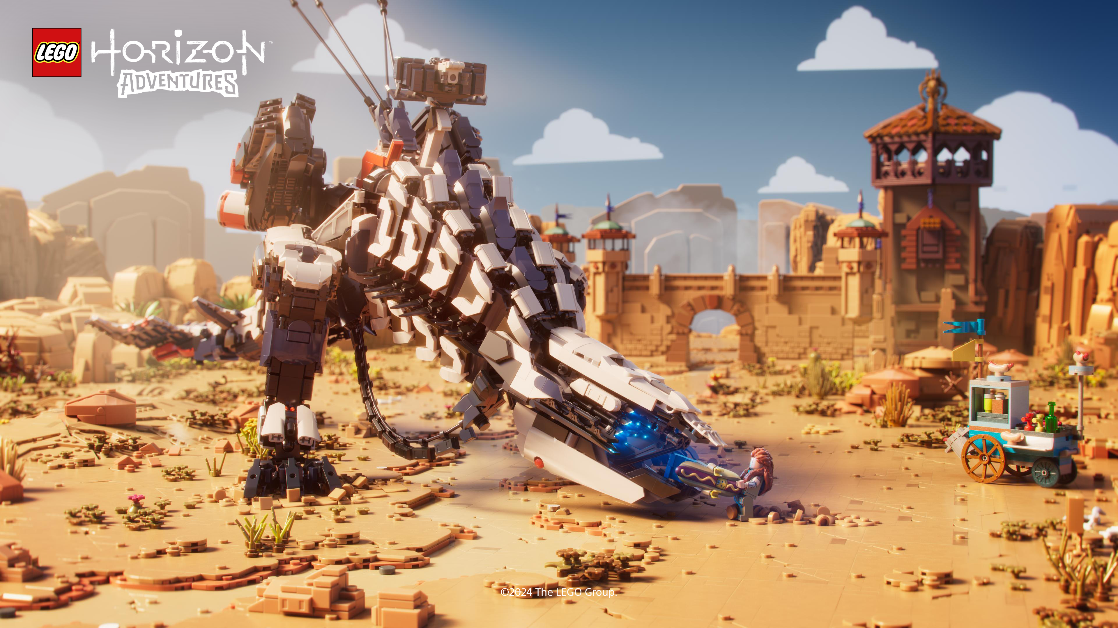 Lego Horizon Adventures Szene: Lego Roboter-Dinosaurier und Lego-Struktur in der Wüste.