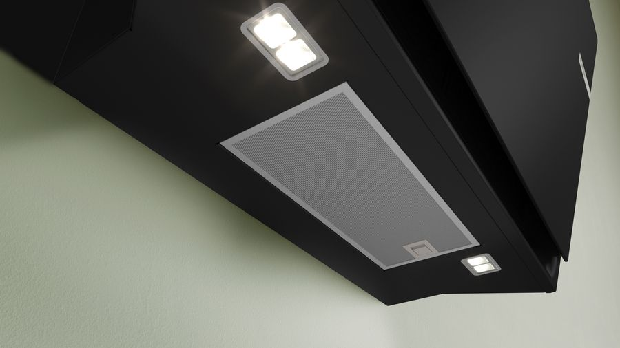 Campana extractora negra, montada en pared, dos luces.