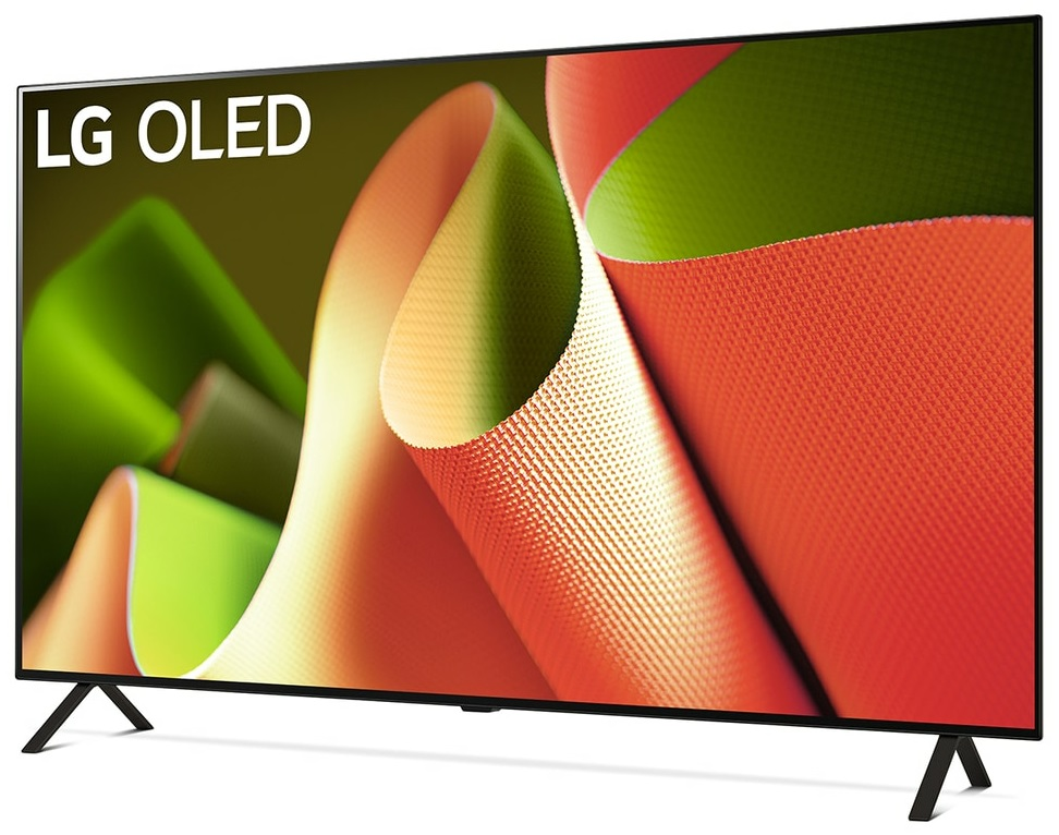 Czarny telewizor LG OLED na stojakach. Ekran wyświetla kolorowe, abstrakcyjne kształty.