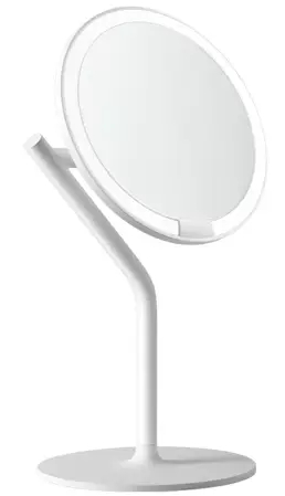 Białe, okrągłe, podświetlane lusterko kosmetyczne z zakrzywioną podporą i okrągłą podstawą.