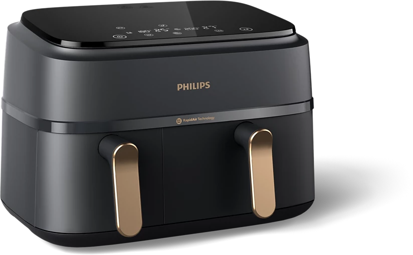 Egy fekete Philips légkeveréses fritőz arany fogantyúkkal. A készülék tetején digitális kijelző található.