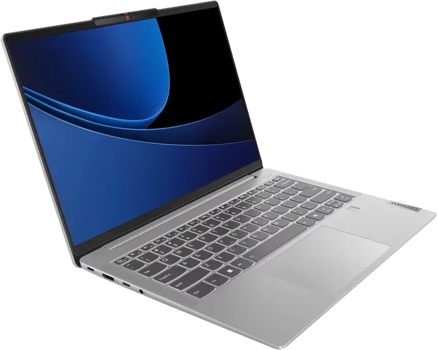 Laptop számítógép az asztalon, kék képernyővel.