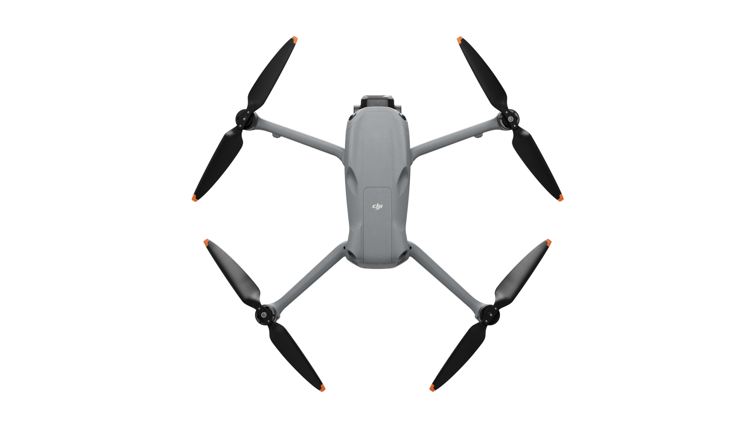 Un dron gris con cuatro hélices negras, visto desde arriba, sobre fondo negro.