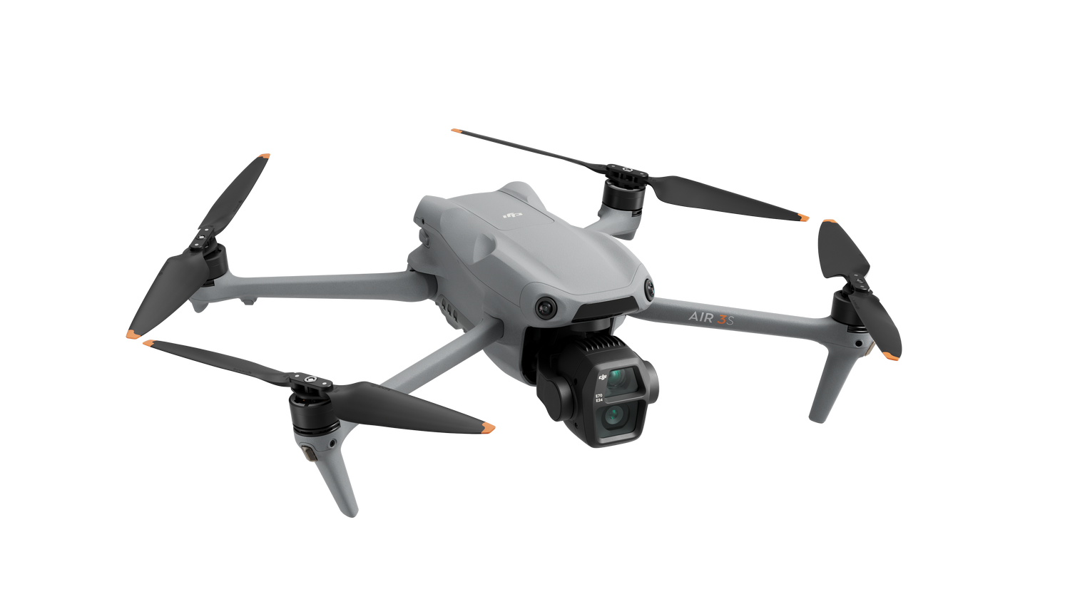 Dron gris sobre fondo negro, con cuatro hélices y una cámara.