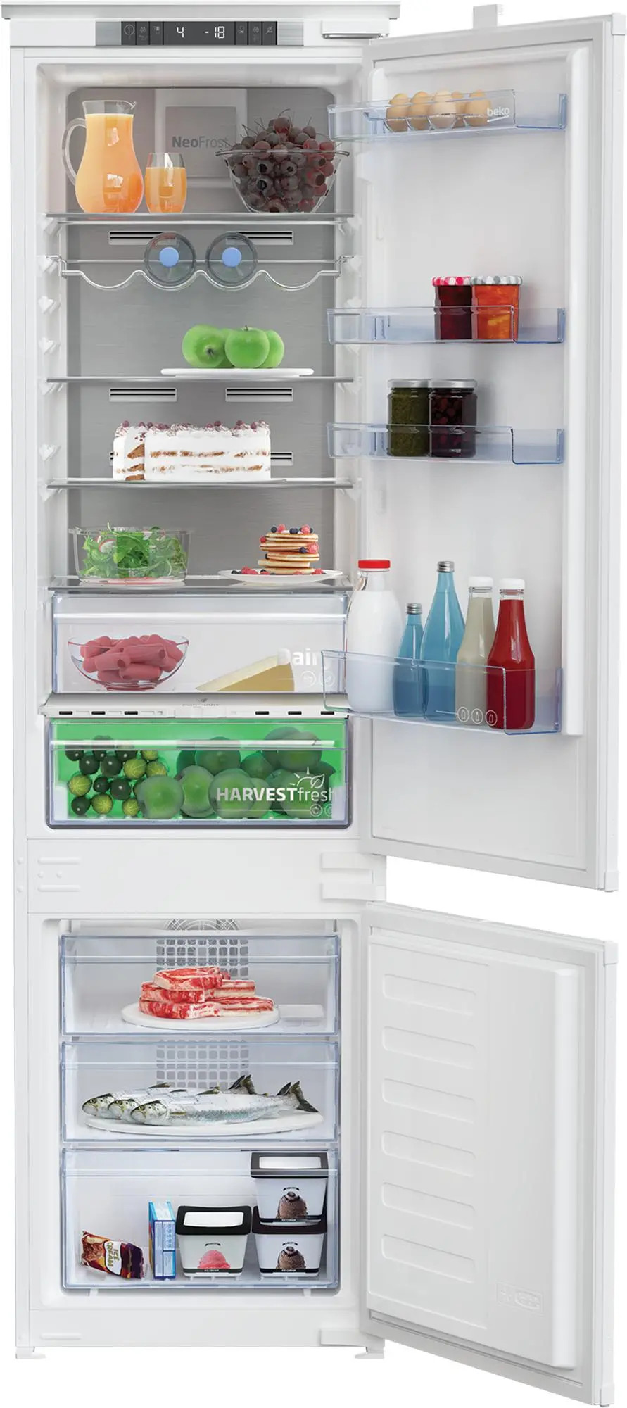 Otwarta lodówka, pełna jedzenia, prezentująca różne komory.