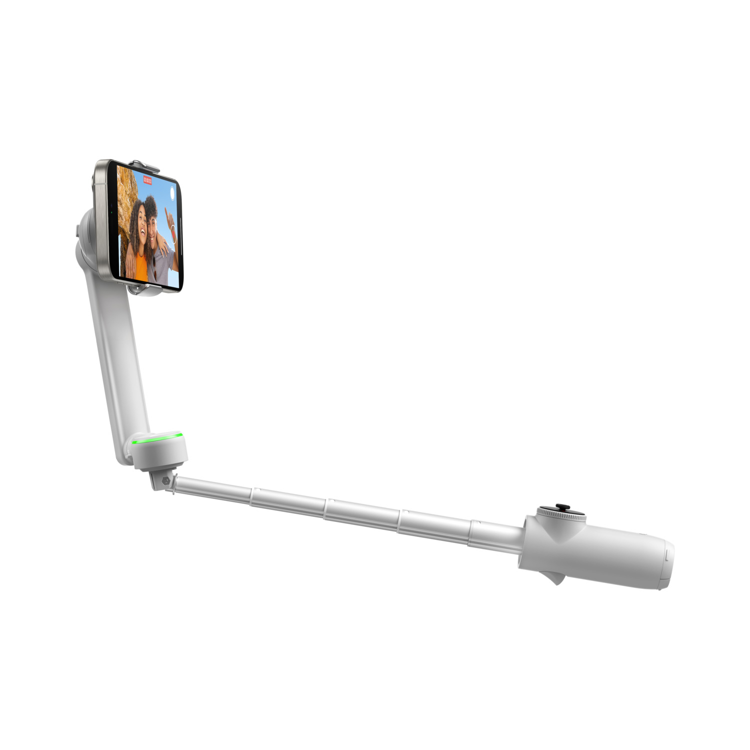 A white selfie stick with a phone attached, displaying a selfie.