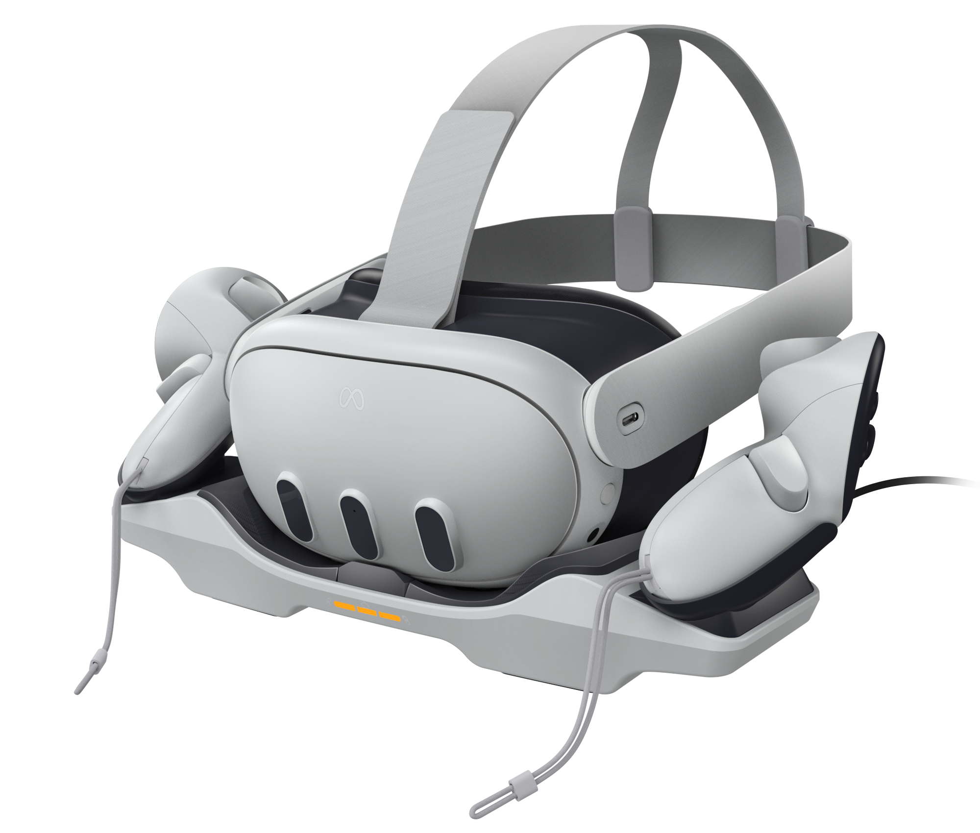 Weißes VR-Headset mit Controllern auf einer Ladestation. Das Headset ist grau und schwarz.
