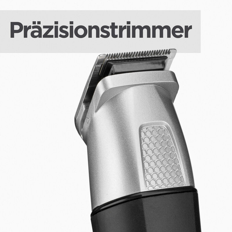 Ein silberner Haarschneider mit dem Wort Präzisionstrimmer. Der Trimmer ist vor weißem Hintergrund.