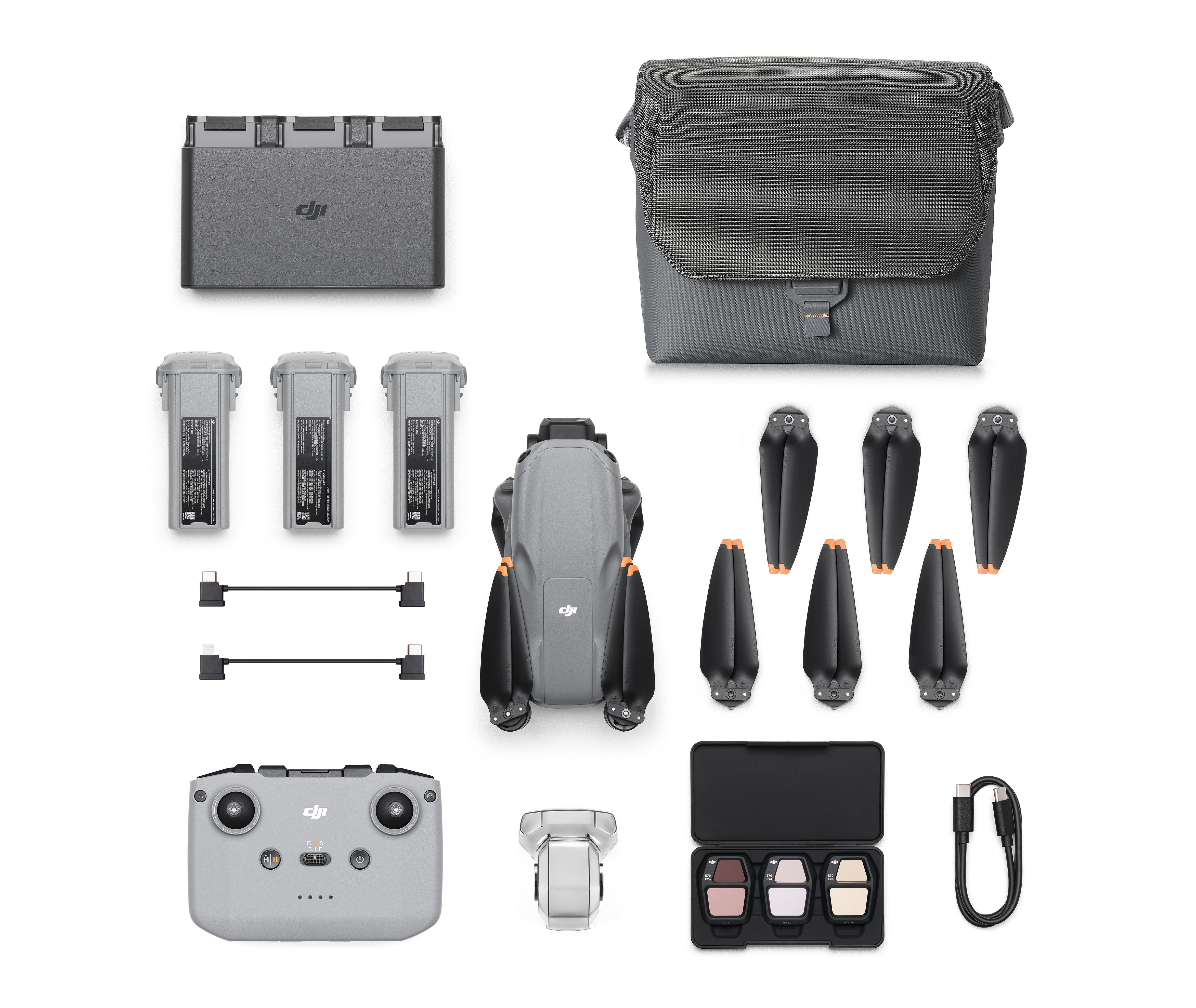 Drohnen Teile, graue Drohne, Controller, Hülle, Batterien, Requisiten und Ladegerät.