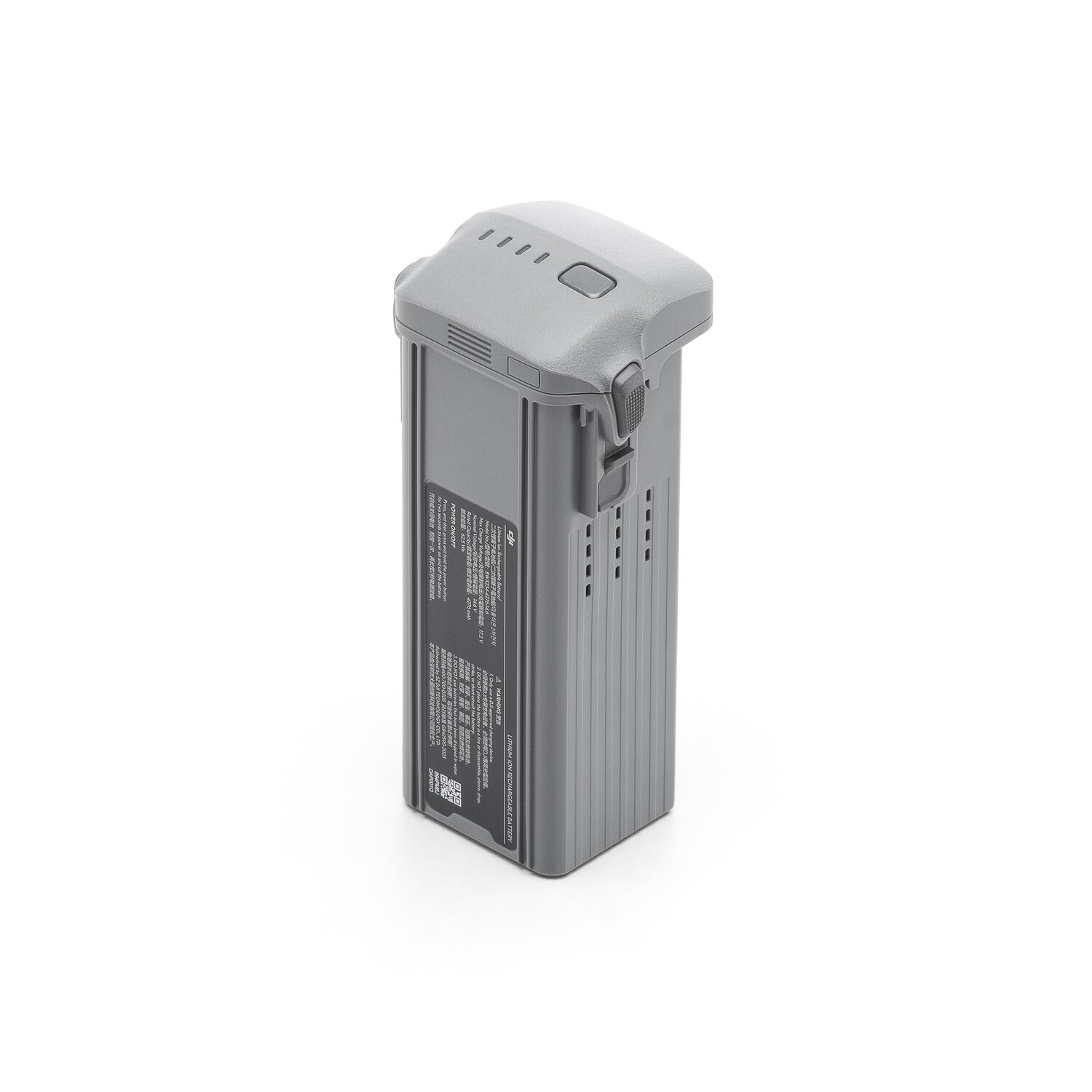 A black Belkin power bank with USB ports on a white surface.