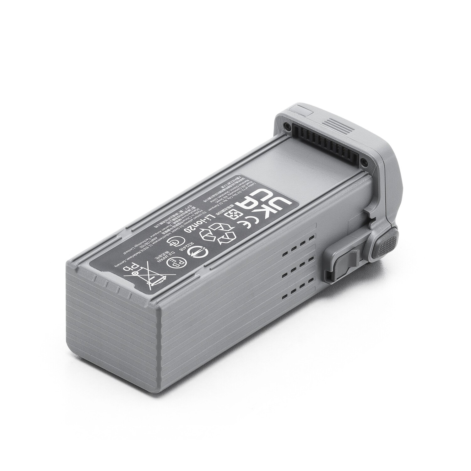 A grey battery pack. It is rectangular with a label and ports. The UKCA and CE marks are visible.
