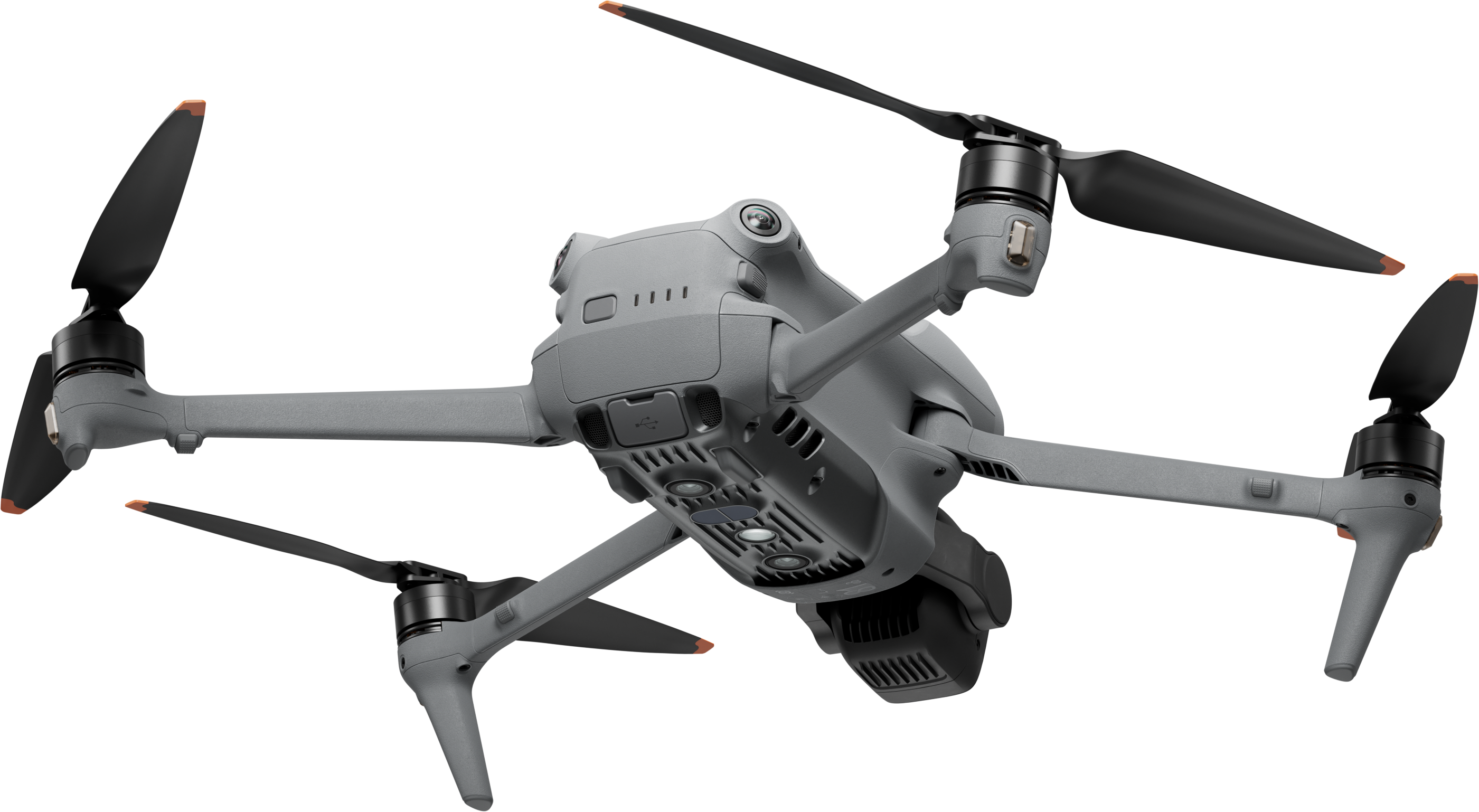 Un drone grigio con quattro eliche su sfondo nero. Il drone è rivolto verso la fotocamera.