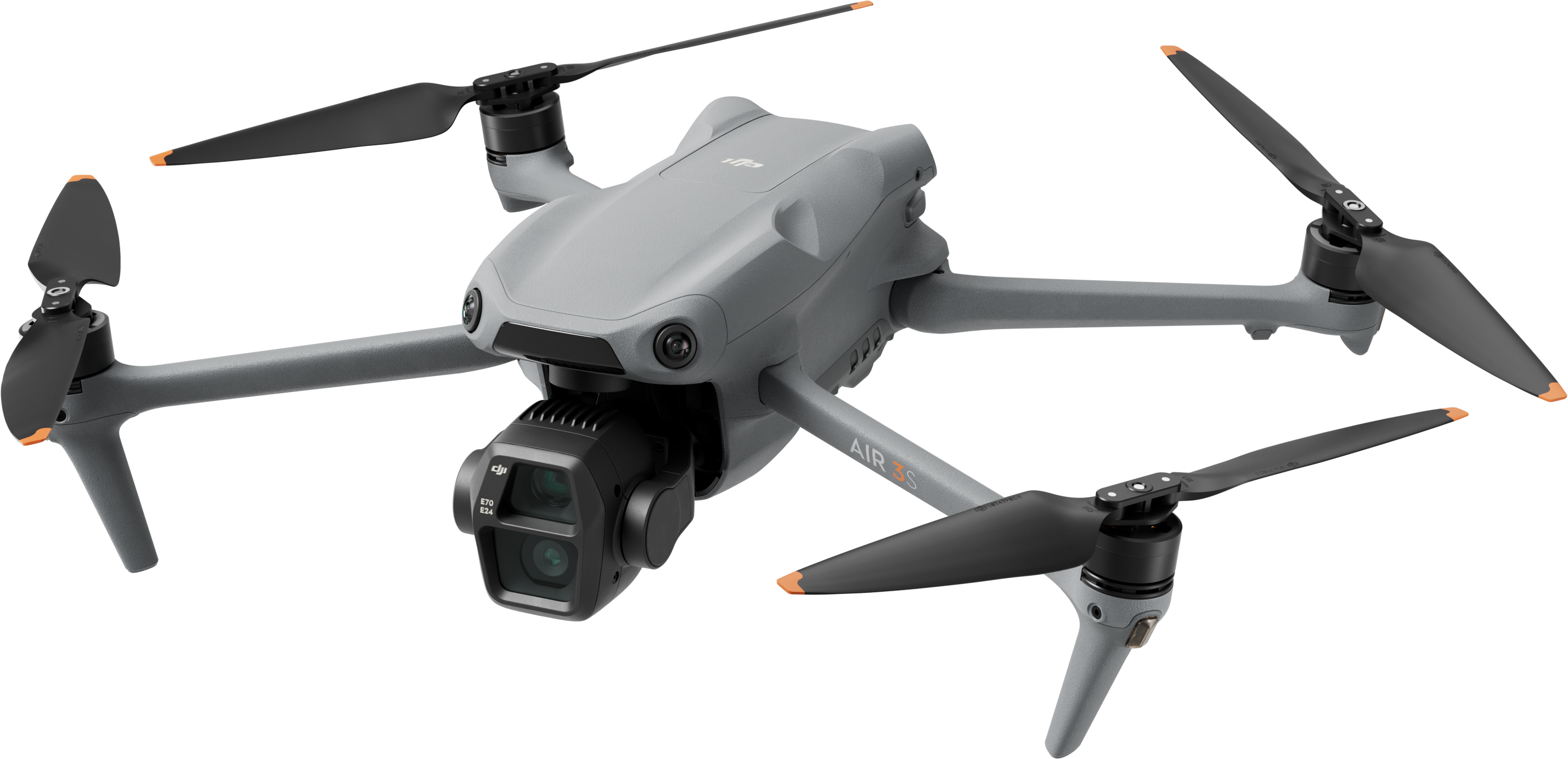 Un drone grigio a mezz'aria, che mostra le sue eliche e la fotocamera.
