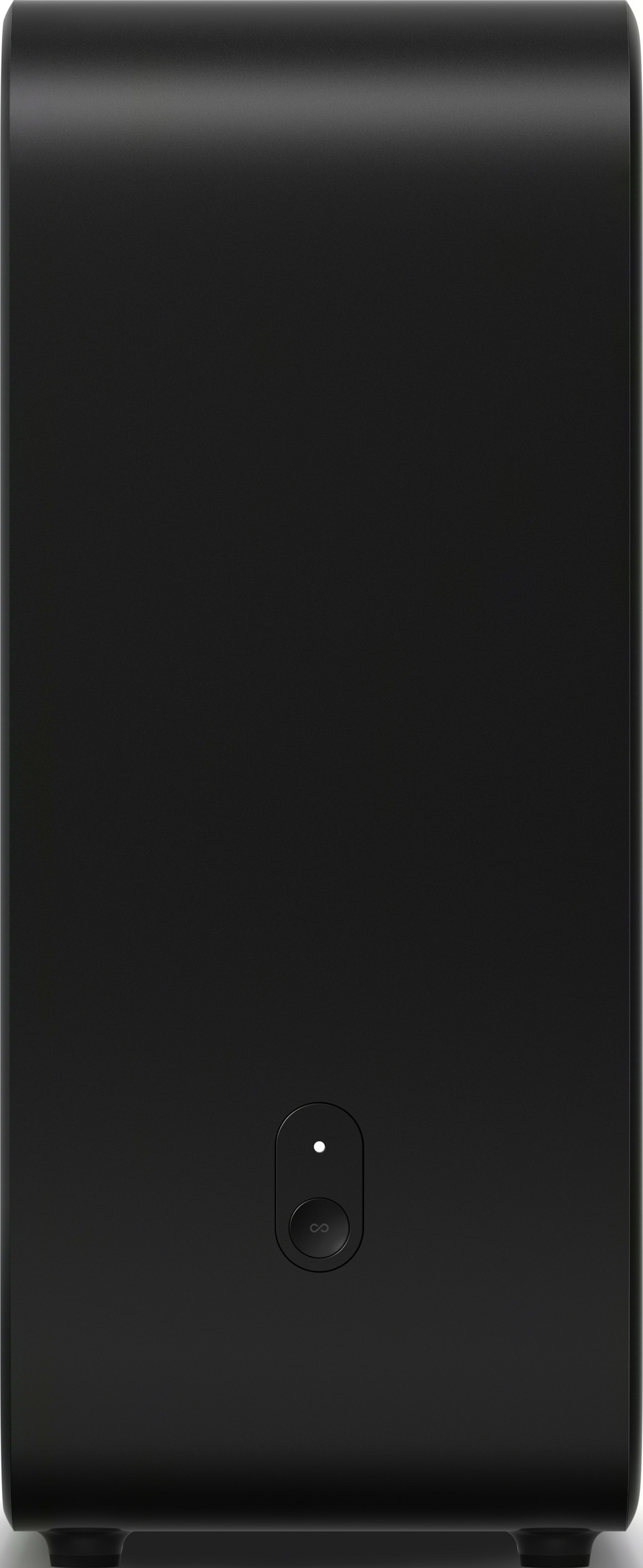 Haut-parleur noir avec un bouton d'alimentation et une petite lumière. Il est sur une surface blanche.