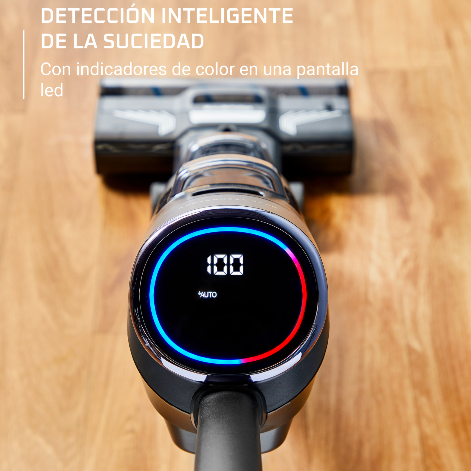 Un cabezal de aspiradora con una pantalla que muestra 100 y la palabra AUTO. Luces azules y rojas.