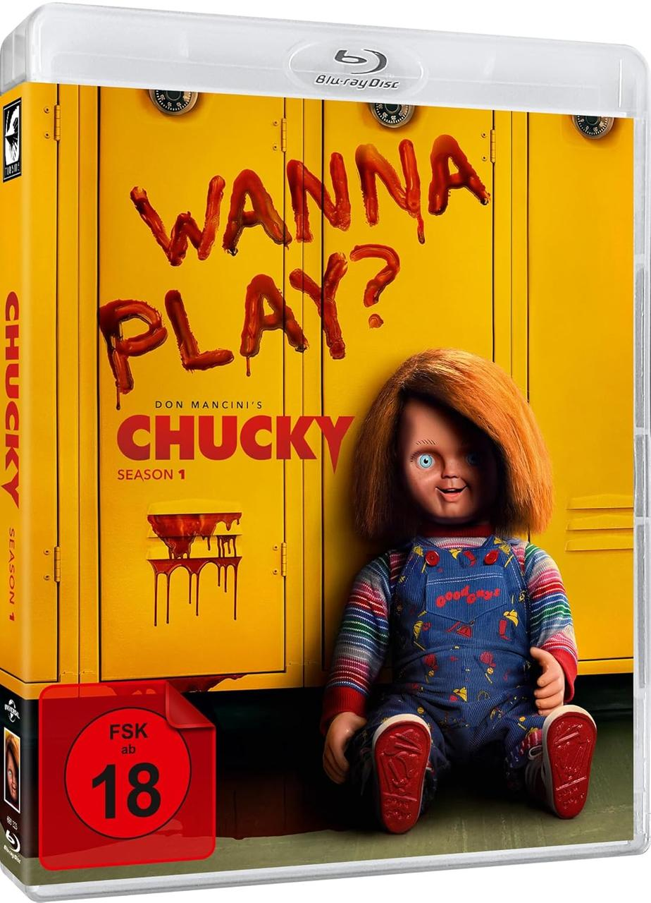 Ein Chucky-Film-Case mit einer Chucky-Puppe darauf.