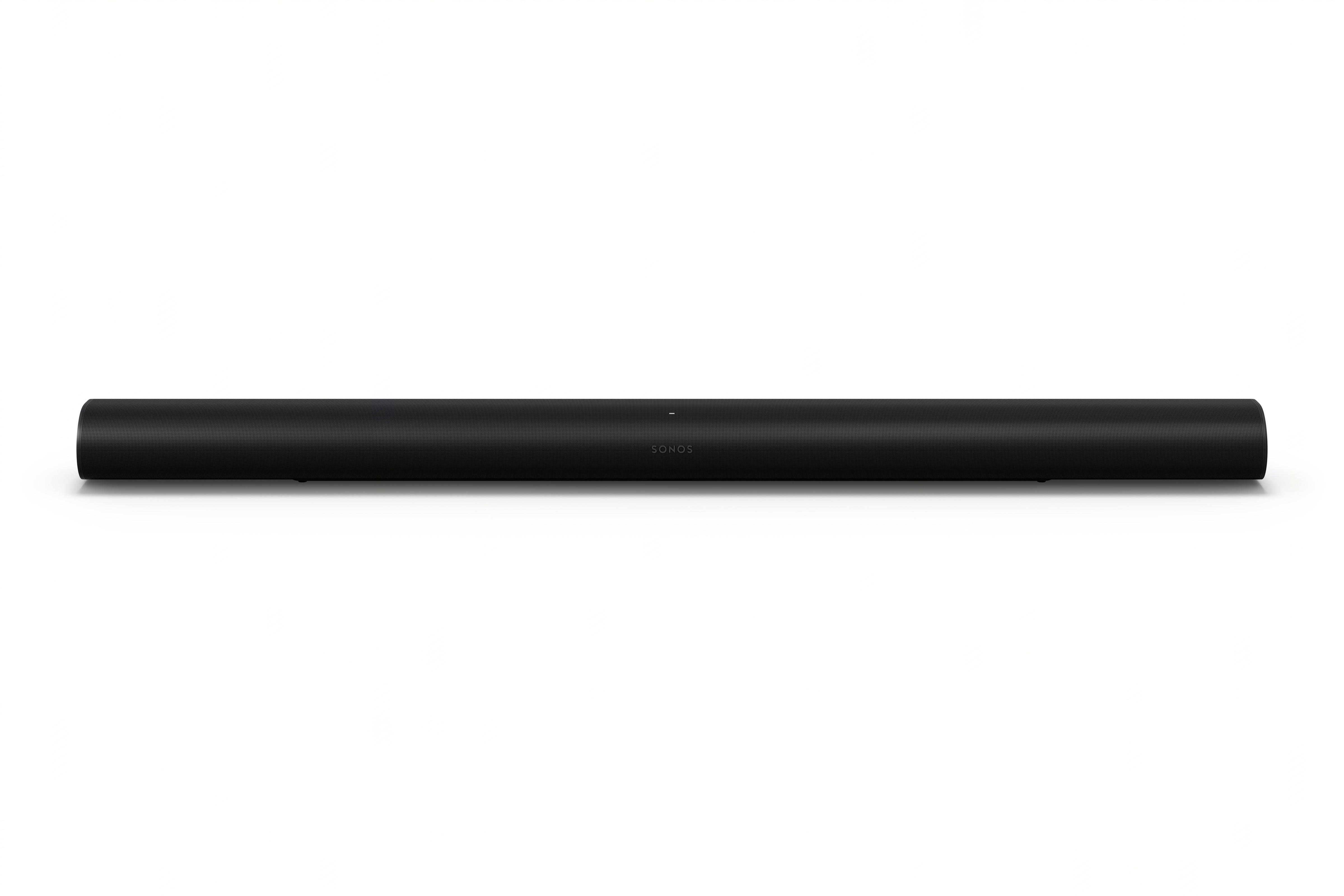 Eine schwarze Soundbar. Sie ist lang und rechteckig mit weißem Hintergrund. Sonos steht darauf.