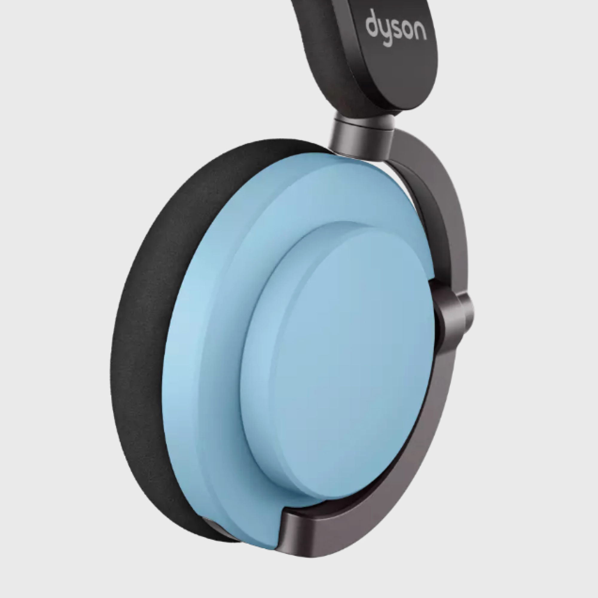 Zbliżenie na nausznik słuchawek Dyson, jasnoniebieski z czarnym obramowaniem.