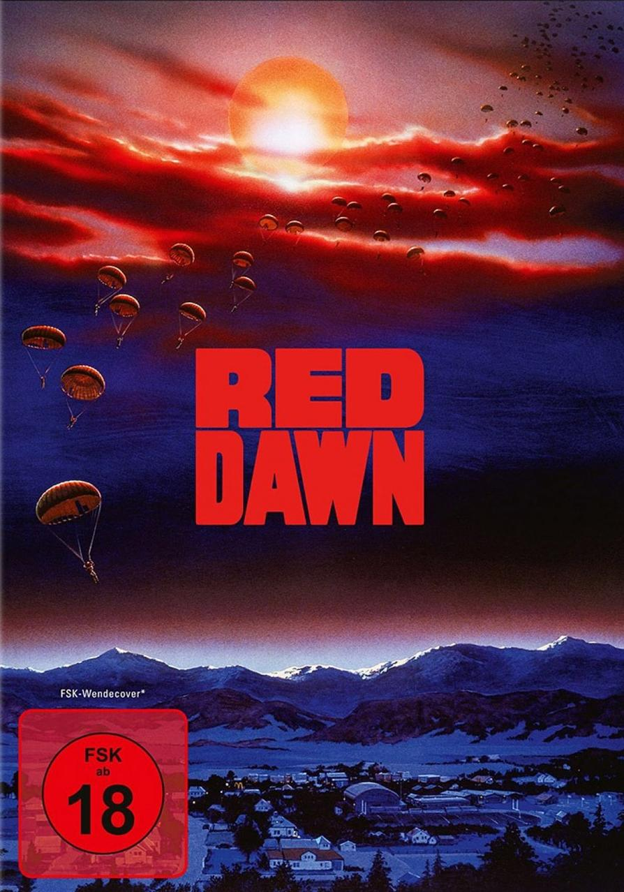 DVD-Cover. Roter Himmel mit Fallschirmspringern und dem Titel "Red Dawn" in roten Buchstaben.