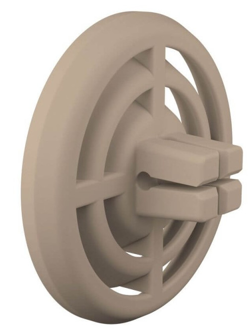 Beżowa plastikowa część z okrągłym wzorem i klipsem.