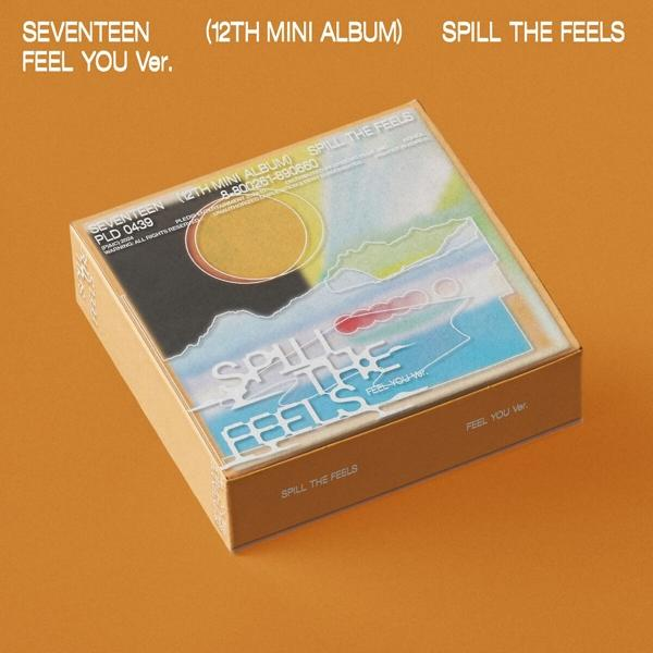 Albumverpackungsbox mit dem Titel 'Spill The Feels'. Oranger Hintergrund.