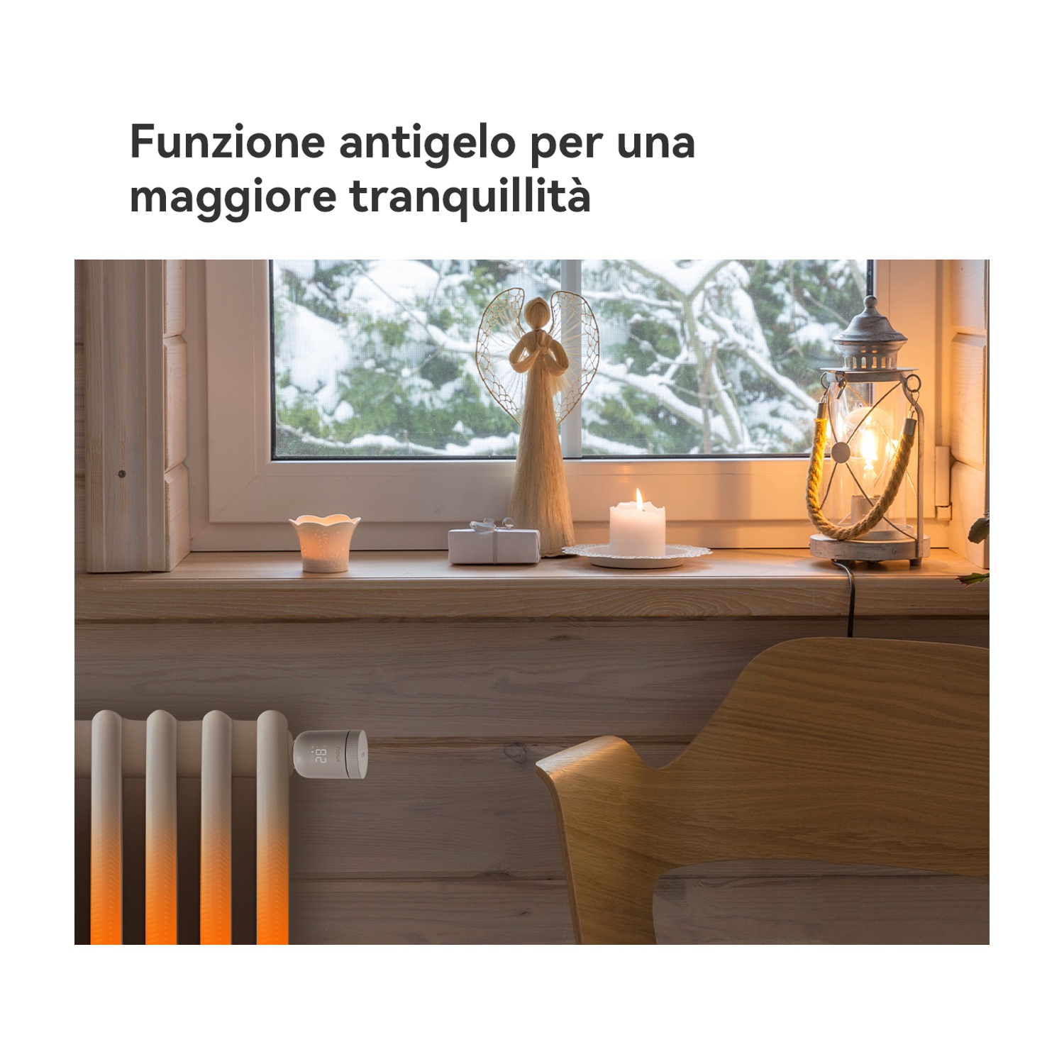 Davanzale con candela, angelo decorativo, lampada e radiatore con termostato digitale.