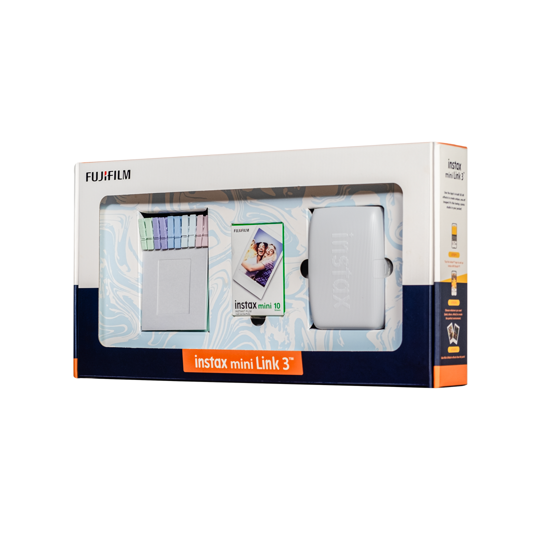 Kutuda Instax Mini Link 3 fotoğraf yazıcı kiti, yazıcı, film ve aksesuarları içerir.