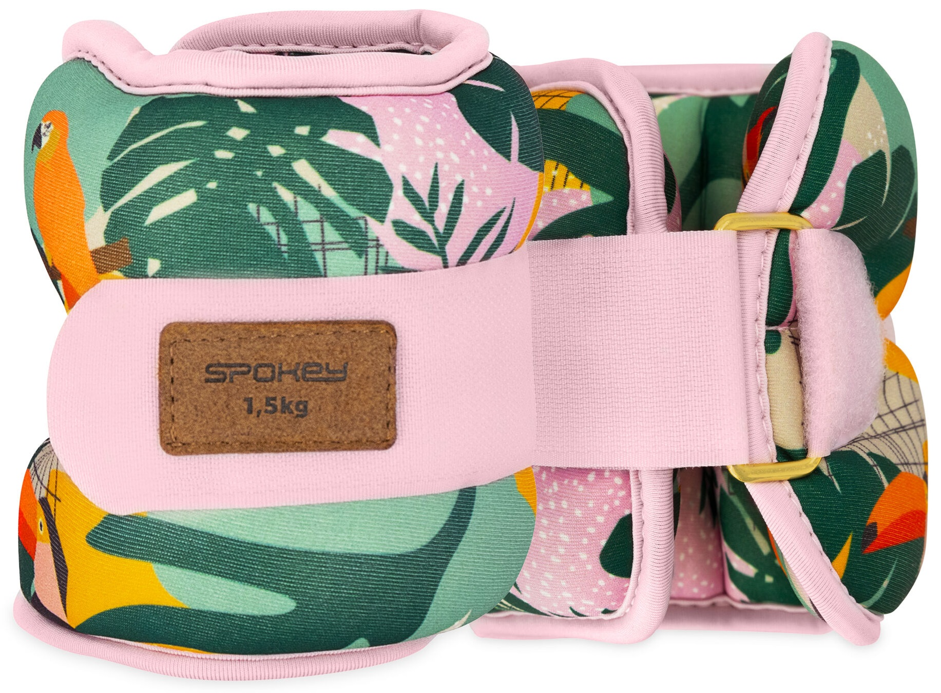 Różowe i zielone obciążniki na kostki. Obciążniki są różowe ze wzorem w stylu dżungli.